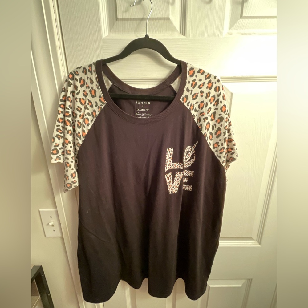 Black with leopard print sleeves and love on the front of the shirt